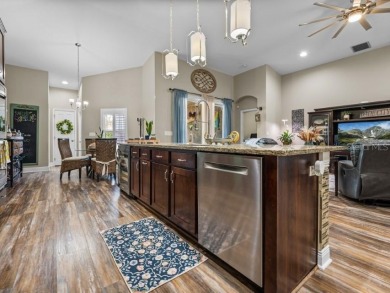 Pride of ownership shines throughout this beautifully maintained on Lake Jovita Golf and Country Club in Florida - for sale on GolfHomes.com, golf home, golf lot