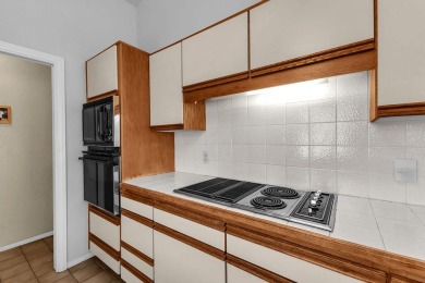 This light-filled condo in the prestigious guard-gated community on Indian Wells Golf Resort and Country Club in California - for sale on GolfHomes.com, golf home, golf lot