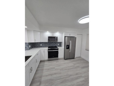 PRICE REDUCED! Very desirable unit!!Completely remodeled! 1st on Flamingo Lakes Country Club in Florida - for sale on GolfHomes.com, golf home, golf lot