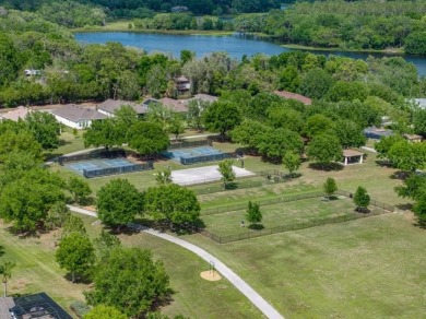 Pride of ownership shines throughout this beautifully maintained on Lake Jovita Golf and Country Club in Florida - for sale on GolfHomes.com, golf home, golf lot