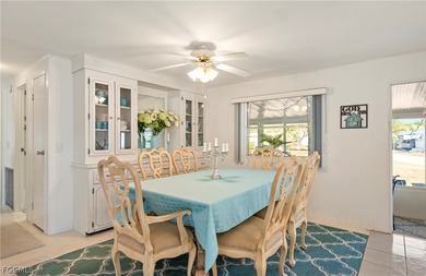 Fully furnished manufactured home in a 55+ waterfront gulf on Riverbend Golf and Country Club in Florida - for sale on GolfHomes.com, golf home, golf lot