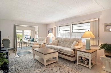 Fully furnished manufactured home in a 55+ waterfront gulf on Riverbend Golf and Country Club in Florida - for sale on GolfHomes.com, golf home, golf lot