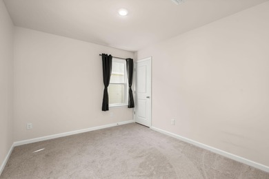 Located in the Jasmine Point lakes community of Cane Bay on Cypress Point Par 3 in South Carolina - for sale on GolfHomes.com, golf home, golf lot