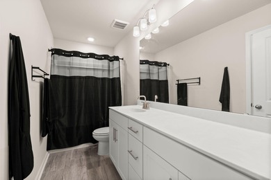 Located in the Jasmine Point lakes community of Cane Bay on Cypress Point Par 3 in South Carolina - for sale on GolfHomes.com, golf home, golf lot