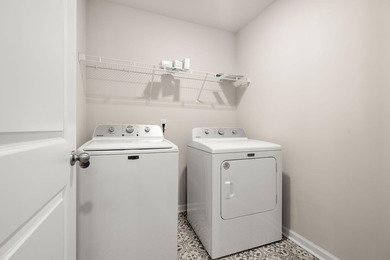 Located in the Jasmine Point lakes community of Cane Bay on Cypress Point Par 3 in South Carolina - for sale on GolfHomes.com, golf home, golf lot