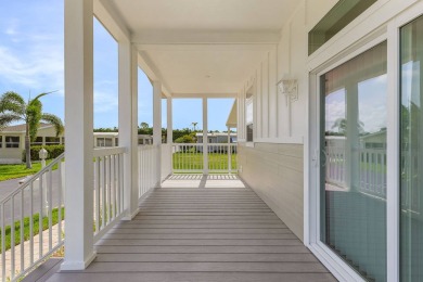 This 2024 Jacobsen Home offering two bedrooms, two bath, is on Royal Wood Golf and Country Club in Florida - for sale on GolfHomes.com, golf home, golf lot