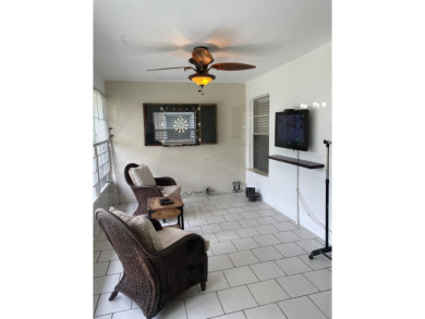 Beautiful updated Bermuda model villa  2 bedroom + den area on Cypress Lakes Golf Course - West Palm Beach in Florida - for sale on GolfHomes.com, golf home, golf lot