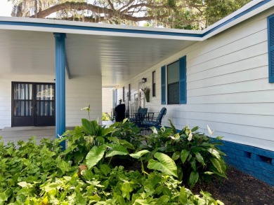 Come and ENJOY a Comfortable Serene Lifestyle ON THE WATER in a on Water Oak Country Club Estates in Florida - for sale on GolfHomes.com, golf home, golf lot