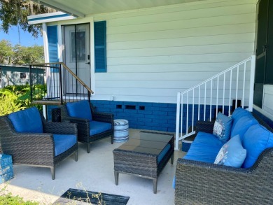 Come and ENJOY a Comfortable Serene Lifestyle ON THE WATER in a on Water Oak Country Club Estates in Florida - for sale on GolfHomes.com, golf home, golf lot
