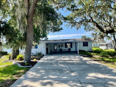 Come and ENJOY a Comfortable Serene Lifestyle ON THE WATER in a on Water Oak Country Club Estates in Florida - for sale on GolfHomes.com, golf home, golf lot