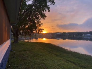 Come and ENJOY a Comfortable Serene Lifestyle ON THE WATER in a on Water Oak Country Club Estates in Florida - for sale on GolfHomes.com, golf home, golf lot