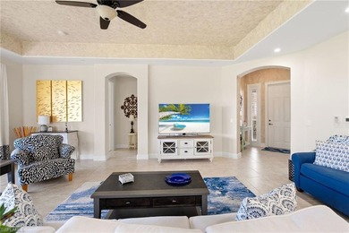 Experience luxury condominium living in this stunning 3-bedroom on Vineyards Golf and Country Club in Florida - for sale on GolfHomes.com, golf home, golf lot
