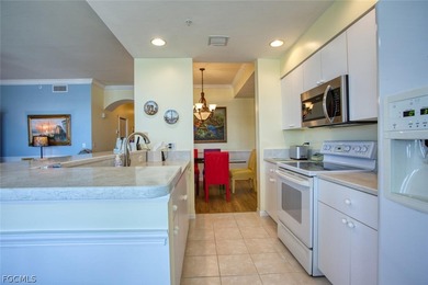 Peaceful water views abound in this third-floor condo on Heritage Palms Golf and Country Club in Florida - for sale on GolfHomes.com, golf home, golf lot