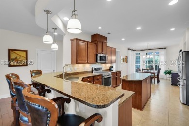 Enjoy stunning water-to-golf course views in this elegant 3 on Argent Lakes Golf Course in South Carolina - for sale on GolfHomes.com, golf home, golf lot