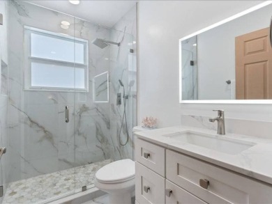 Where Lake Views, Lush Vibes, and Lasting Memories Await on Hollybrook Golf and Tennis Club  in Florida - for sale on GolfHomes.com, golf home, golf lot