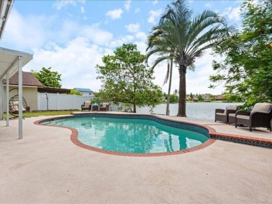 Where Lake Views, Lush Vibes, and Lasting Memories Await on Hollybrook Golf and Tennis Club  in Florida - for sale on GolfHomes.com, golf home, golf lot