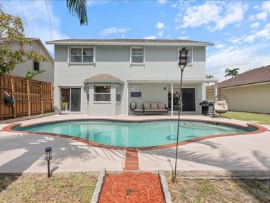 Where Lake Views, Lush Vibes, and Lasting Memories Await on Hollybrook Golf and Tennis Club  in Florida - for sale on GolfHomes.com, golf home, golf lot