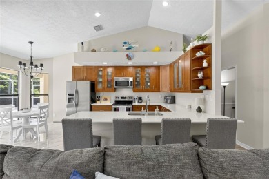 SIZZLING....THIS POOL HOME IS A WINNER --Located in the inviting on River Hills Country Club in Florida - for sale on GolfHomes.com, golf home, golf lot
