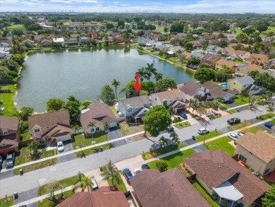 Where Lake Views, Lush Vibes, and Lasting Memories Await on Hollybrook Golf and Tennis Club  in Florida - for sale on GolfHomes.com, golf home, golf lot