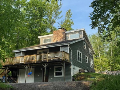 Nestled in the heart of Lakewood, this beautifully updated home on McCauslin Brook Golf and Country Club in Wisconsin - for sale on GolfHomes.com, golf home, golf lot
