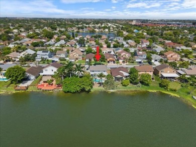 Where Lake Views, Lush Vibes, and Lasting Memories Await on Hollybrook Golf and Tennis Club  in Florida - for sale on GolfHomes.com, golf home, golf lot