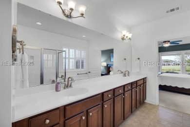 Enjoy stunning water-to-golf course views in this elegant 3 on Argent Lakes Golf Course in South Carolina - for sale on GolfHomes.com, golf home, golf lot