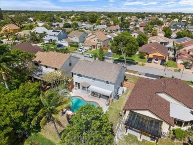 Where Lake Views, Lush Vibes, and Lasting Memories Await on Hollybrook Golf and Tennis Club  in Florida - for sale on GolfHomes.com, golf home, golf lot