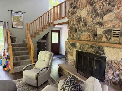 Nestled in the heart of Lakewood, this beautifully updated home on McCauslin Brook Golf and Country Club in Wisconsin - for sale on GolfHomes.com, golf home, golf lot