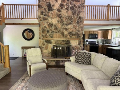 Nestled in the heart of Lakewood, this beautifully updated home on McCauslin Brook Golf and Country Club in Wisconsin - for sale on GolfHomes.com, golf home, golf lot