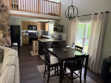 Nestled in the heart of Lakewood, this beautifully updated home on McCauslin Brook Golf and Country Club in Wisconsin - for sale on GolfHomes.com, golf home, golf lot