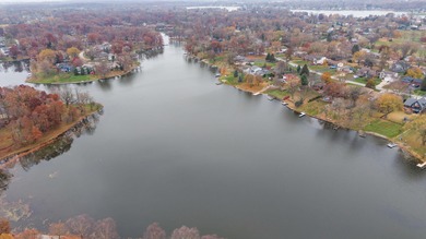 Welcome to your lakefront opportunity on beautiful Bass Lake in on Lakes of the Four Seasons Country Club in Indiana - for sale on GolfHomes.com, golf home, golf lot