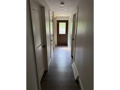 Nestled in the heart of Lakewood, this beautifully updated home on McCauslin Brook Golf and Country Club in Wisconsin - for sale on GolfHomes.com, golf home, golf lot