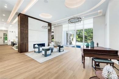 Nestled on a private and serene .73-acre lake-view cul de sac on Grey Oaks Golf and Country Club in Florida - for sale on GolfHomes.com, golf home, golf lot