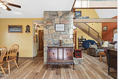 This 3-bedroom, 2-bath beauty sits on two very private lots on Bent Creek Golf Course in Tennessee - for sale on GolfHomes.com, golf home, golf lot