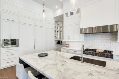 Nestled on a private and serene .73-acre lake-view cul de sac on Grey Oaks Golf and Country Club in Florida - for sale on GolfHomes.com, golf home, golf lot