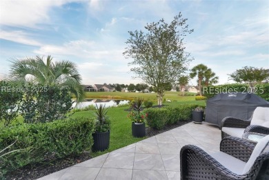 Enjoy stunning water-to-golf course views in this elegant 3 on Argent Lakes Golf Course in South Carolina - for sale on GolfHomes.com, golf home, golf lot