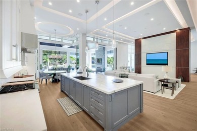 Nestled on a private and serene .73-acre lake-view cul de sac on Grey Oaks Golf and Country Club in Florida - for sale on GolfHomes.com, golf home, golf lot