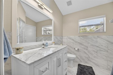 SIZZLING....THIS POOL HOME IS A WINNER --Located in the inviting on River Hills Country Club in Florida - for sale on GolfHomes.com, golf home, golf lot
