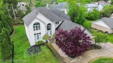 Gorgeous Spacious Contemporary 5 Bedroom Home Situated in a on Knollwood Country Club in Michigan - for sale on GolfHomes.com, golf home, golf lot