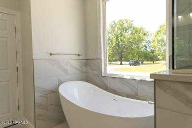 Welcome to 1102 Soundside Road--this brand-new beauty sits right on Chowan Golf and Country Club in North Carolina - for sale on GolfHomes.com, golf home, golf lot
