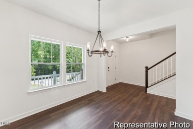 This semi-custom home in Lake Royale offers 3BR/2.5BA and 2,098 on River Golf and County Club at Lake Royale in North Carolina - for sale on GolfHomes.com, golf home, golf lot
