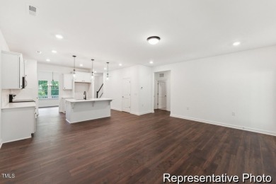 This semi-custom home in Lake Royale offers 3BR/2.5BA and 2,098 on River Golf and County Club at Lake Royale in North Carolina - for sale on GolfHomes.com, golf home, golf lot