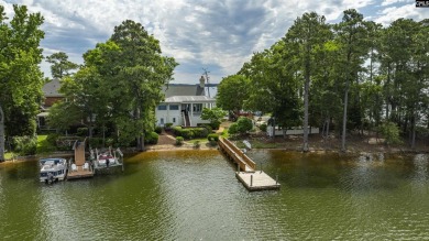 Discover timeless charm and breathtaking views at 318 Lands End on Timberlake Country Club in South Carolina - for sale on GolfHomes.com, golf home, golf lot