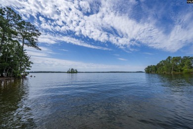 Discover timeless charm and breathtaking views at 318 Lands End on Timberlake Country Club in South Carolina - for sale on GolfHomes.com, golf home, golf lot