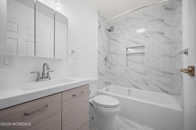Step into this beautifully remodeled 2-bedroom, 1-bath condo in on Greenbriar Woodlands in New Jersey - for sale on GolfHomes.com, golf home, golf lot
