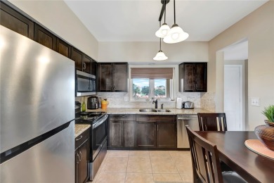 REPIPED. LOOK NO FURTHER, THIS HIGHLY SOUGHT AFTER GRAND HARBOR on Oak Harbor Country Club in Florida - for sale on GolfHomes.com, golf home, golf lot