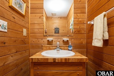 Exceptional contemporary beach home minutes from direct beach on The Currituck Golf Club in North Carolina - for sale on GolfHomes.com, golf home, golf lot