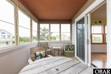 Exceptional contemporary beach home minutes from direct beach on The Currituck Golf Club in North Carolina - for sale on GolfHomes.com, golf home, golf lot