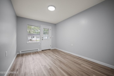 Step into this beautifully remodeled 2-bedroom, 1-bath condo in on Greenbriar Woodlands in New Jersey - for sale on GolfHomes.com, golf home, golf lot