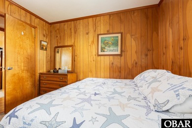 Exceptional contemporary beach home minutes from direct beach on The Currituck Golf Club in North Carolina - for sale on GolfHomes.com, golf home, golf lot